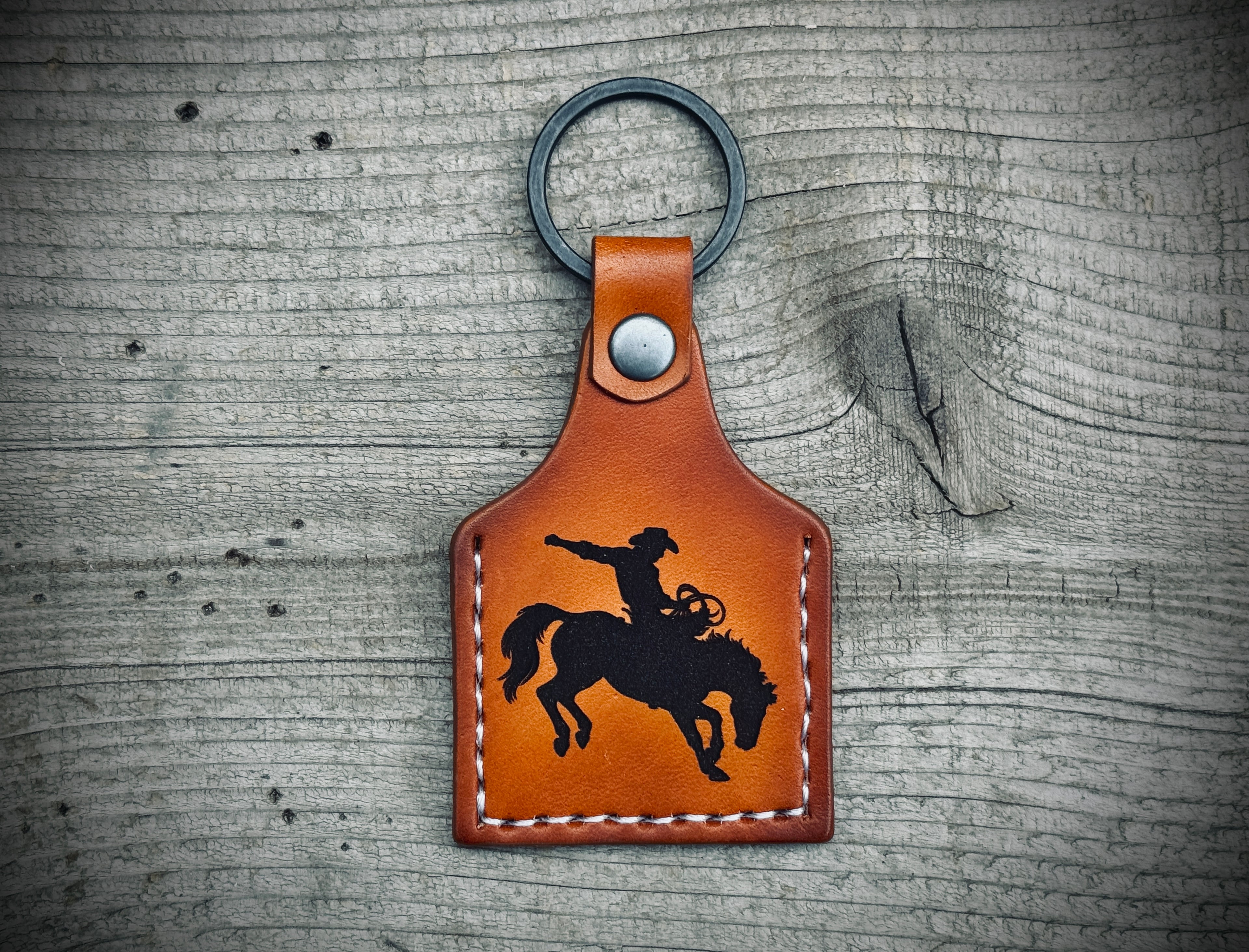 Cowboy Deluxe - Laser Engraved and hand stitched double sided leather cow tag style Keychain