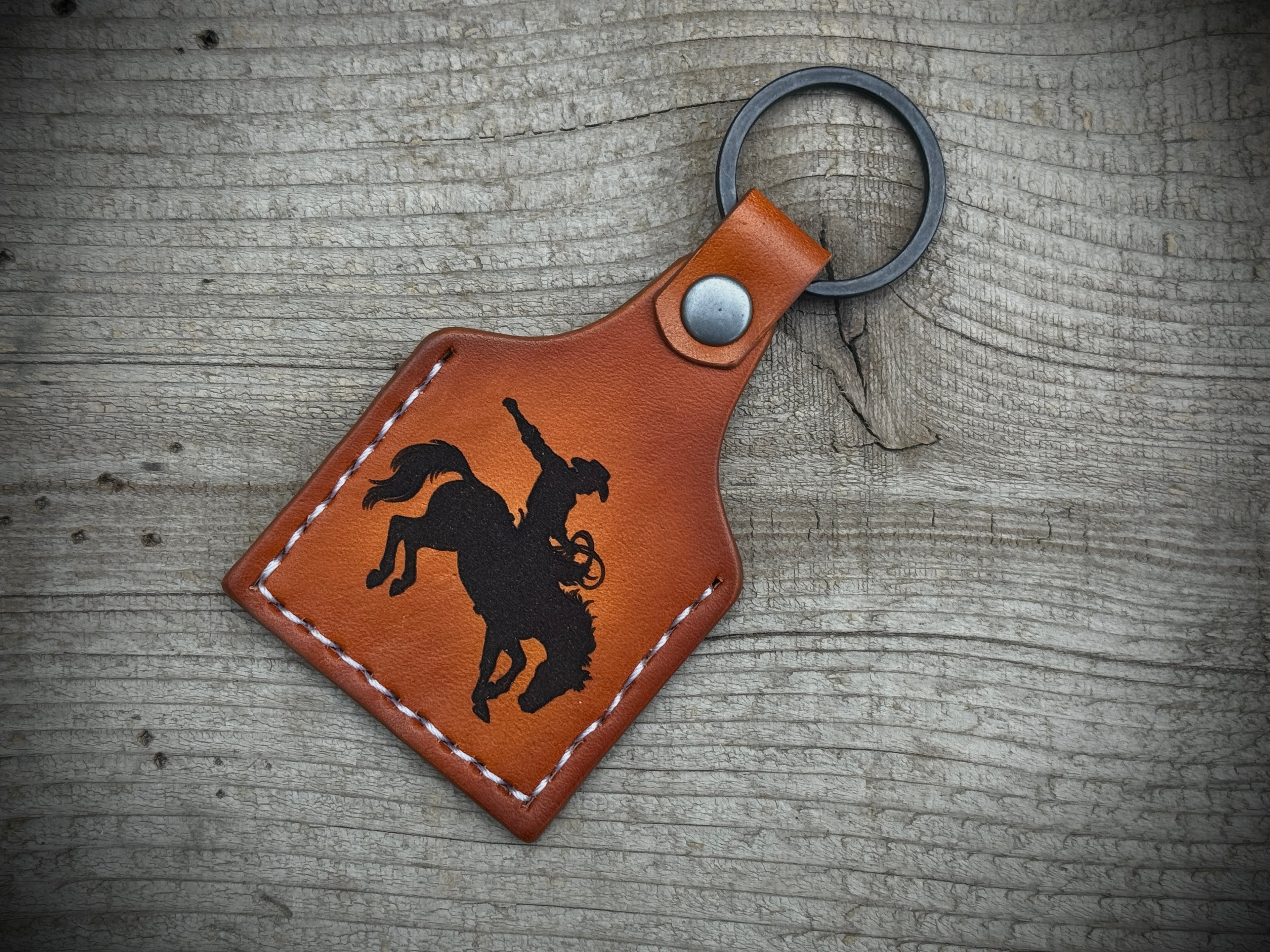 Cowboy Deluxe - Laser Engraved and hand stitched double sided leather cow tag style Keychain