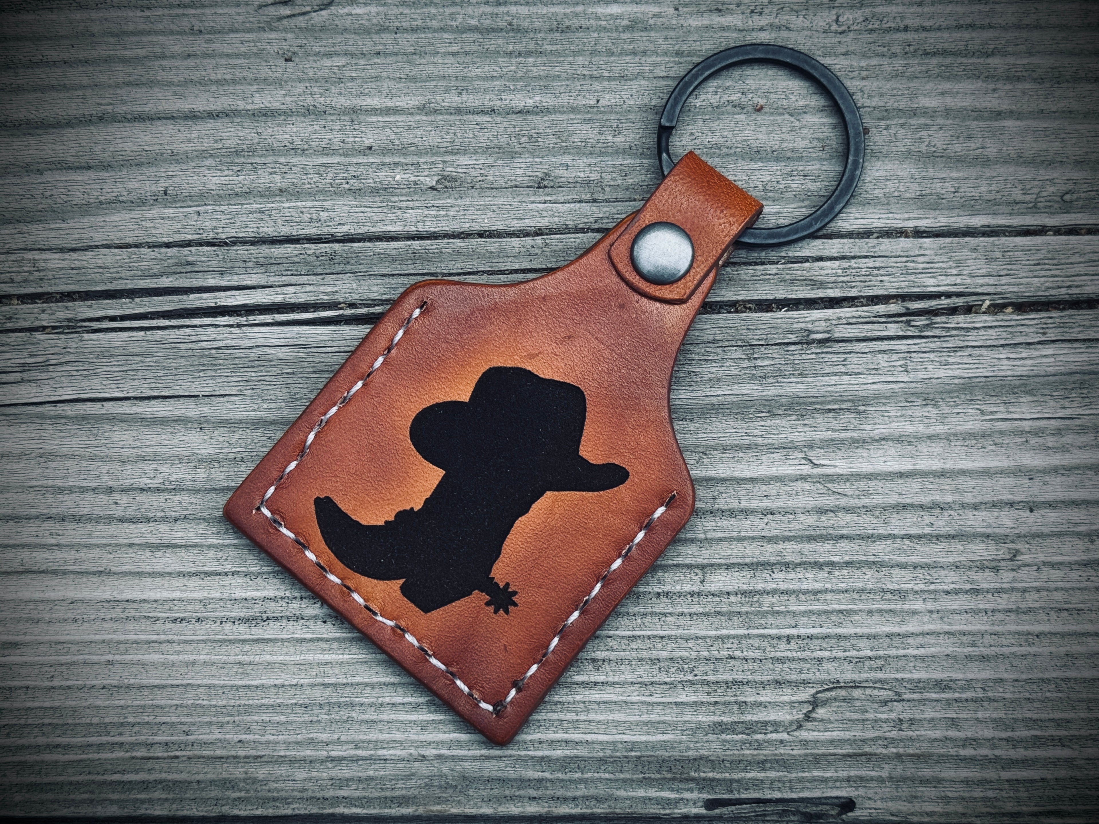 Cowboy Deluxe - Laser Engraved and hand stitched double sided leather cow tag style Keychain