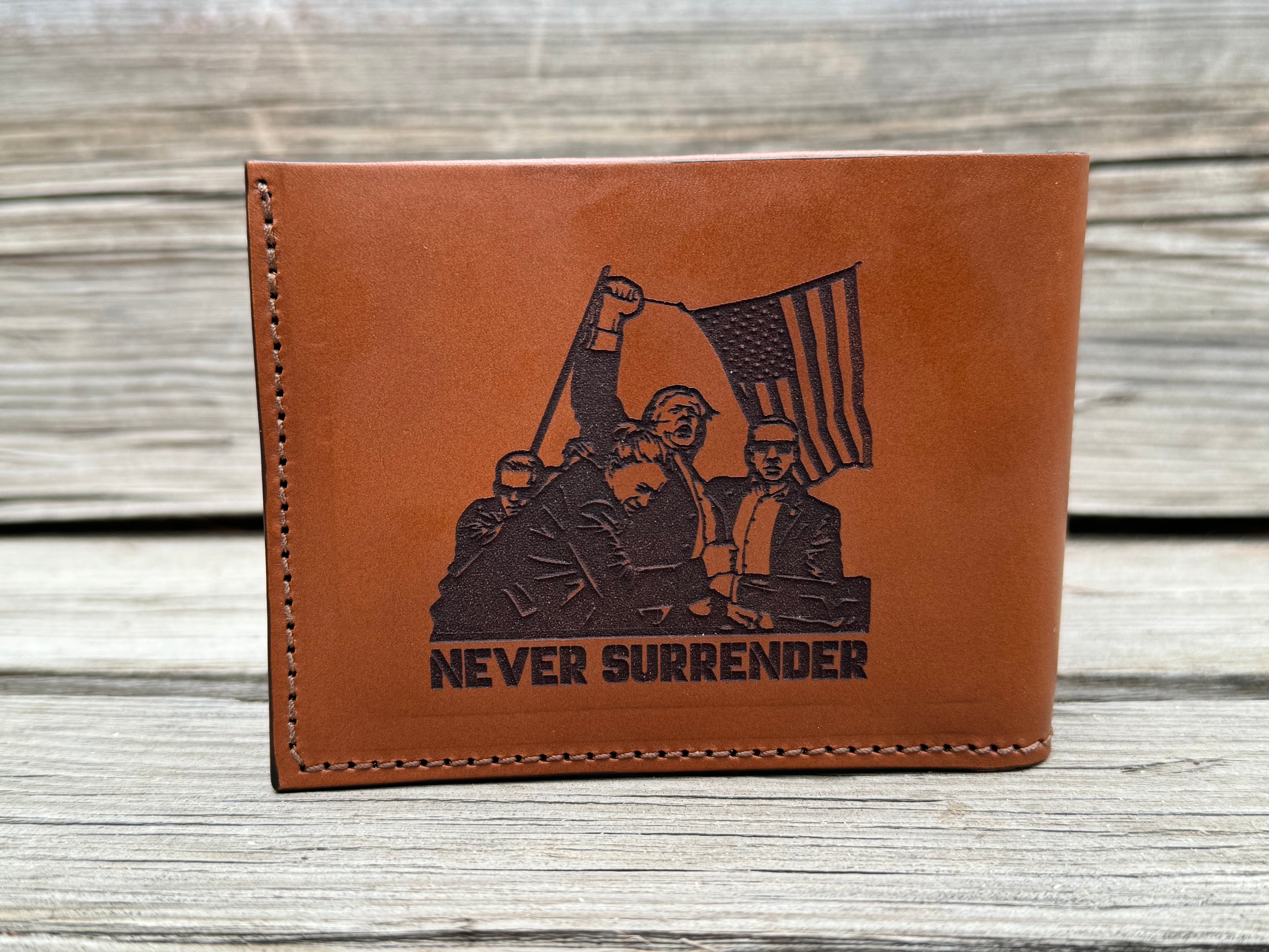Brown leather wallet with Trump never surrender and Bulter PA engraving