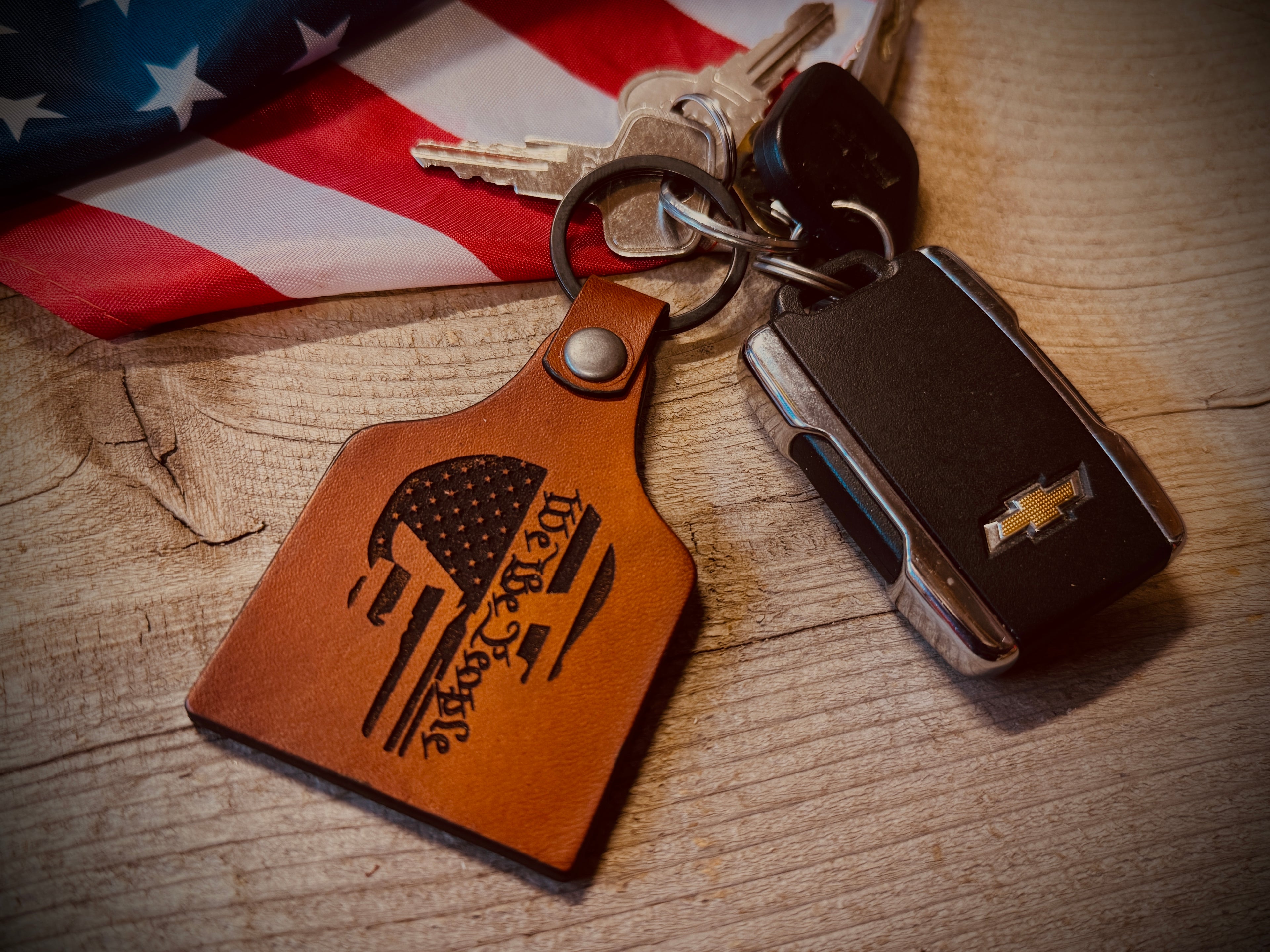 We the people punisher skull laser engraved leather Keychain by Christoph  Joseph