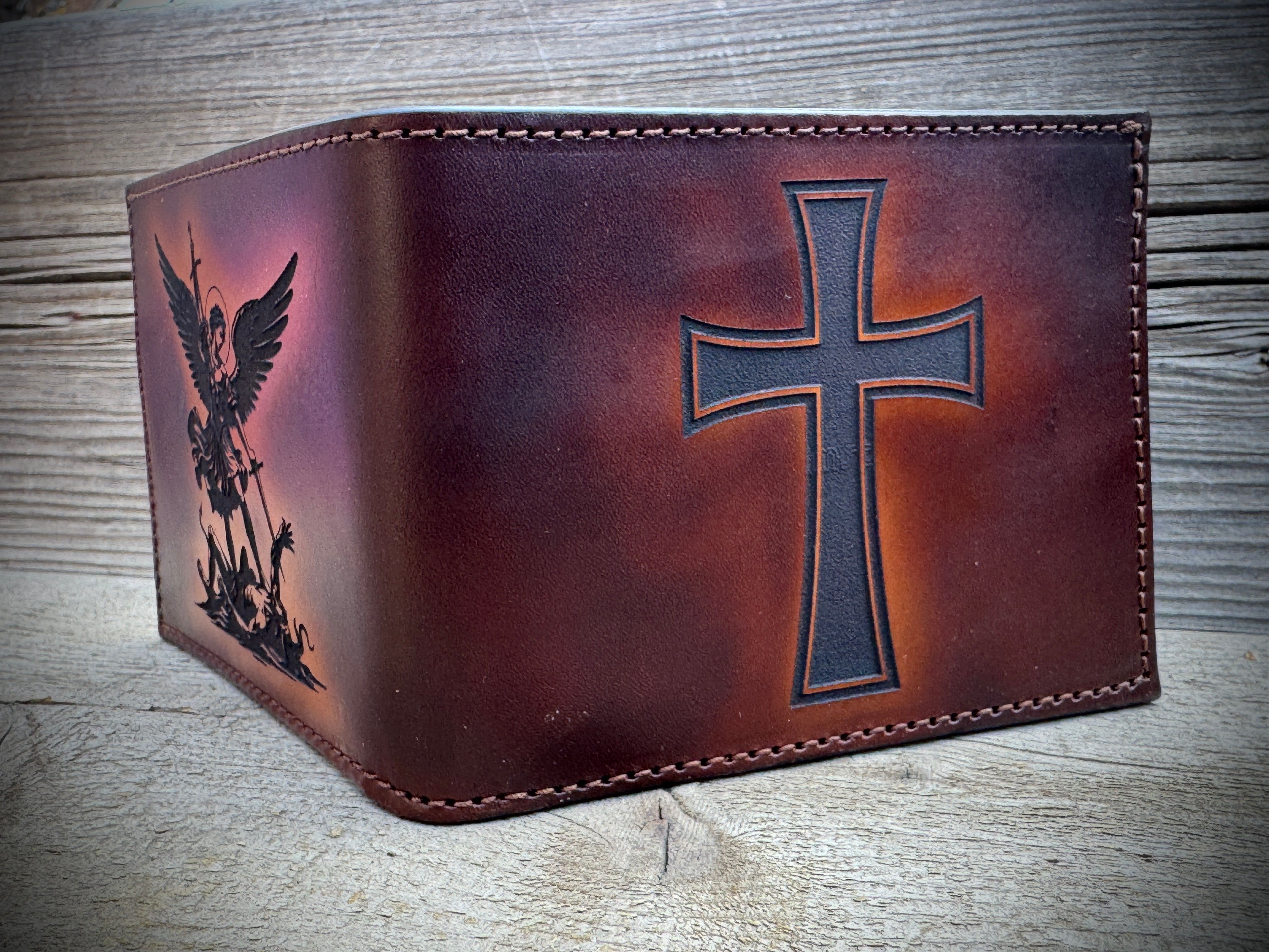 Brown leather wallet with cross and angel design on premium leather
