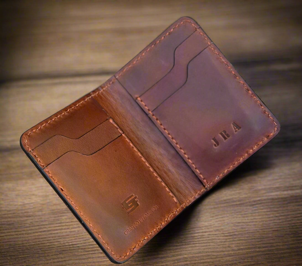 Brown leather credit wallet with visible Christoph Joseph branding 